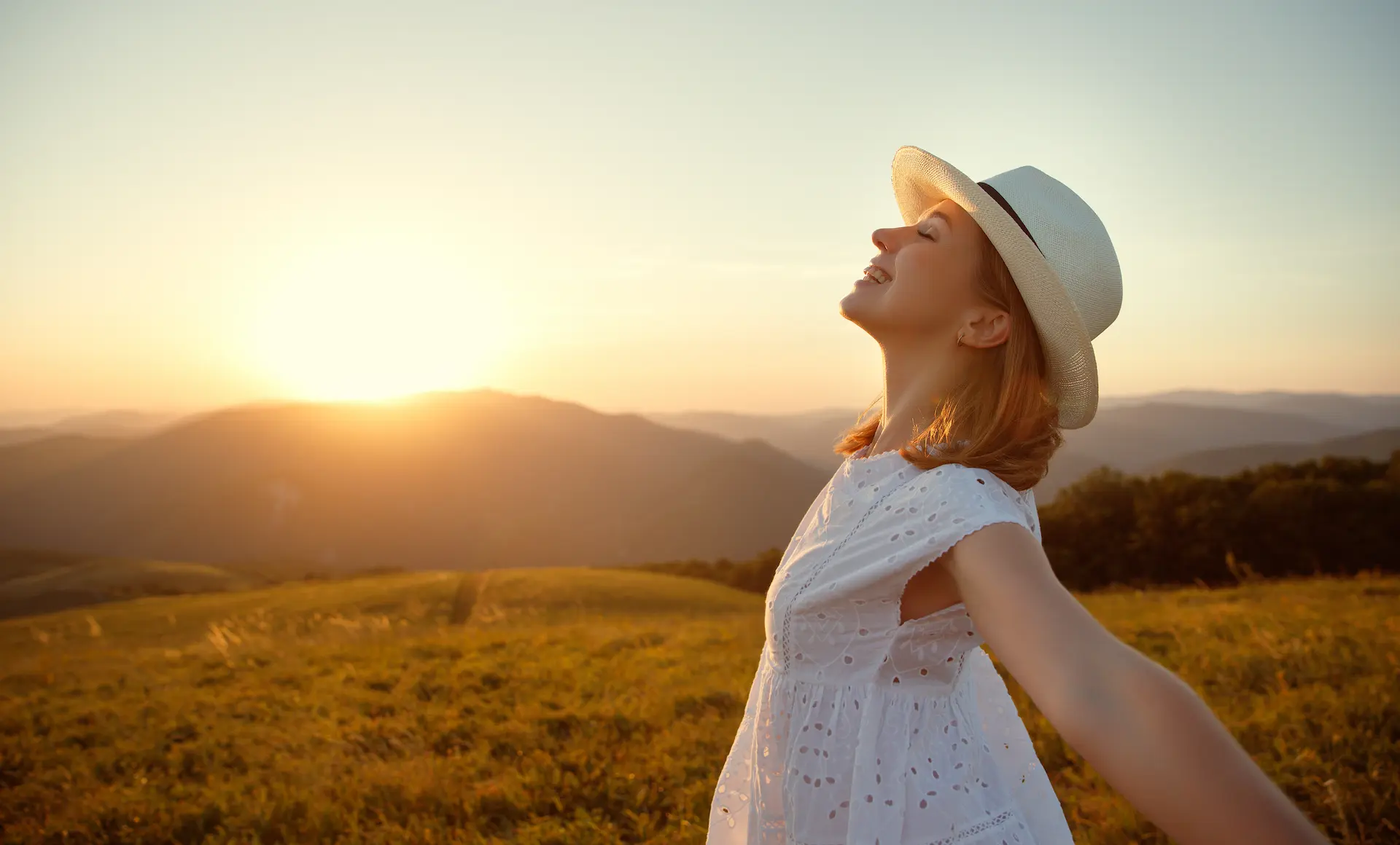 woman smiling in sunset